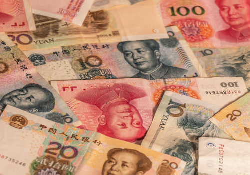 Yuan Faces Downward Pressure as PBoC Sets USD/CNY Reference Rate at 7.1274